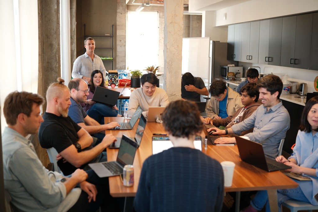 The Halliday team working together in the office